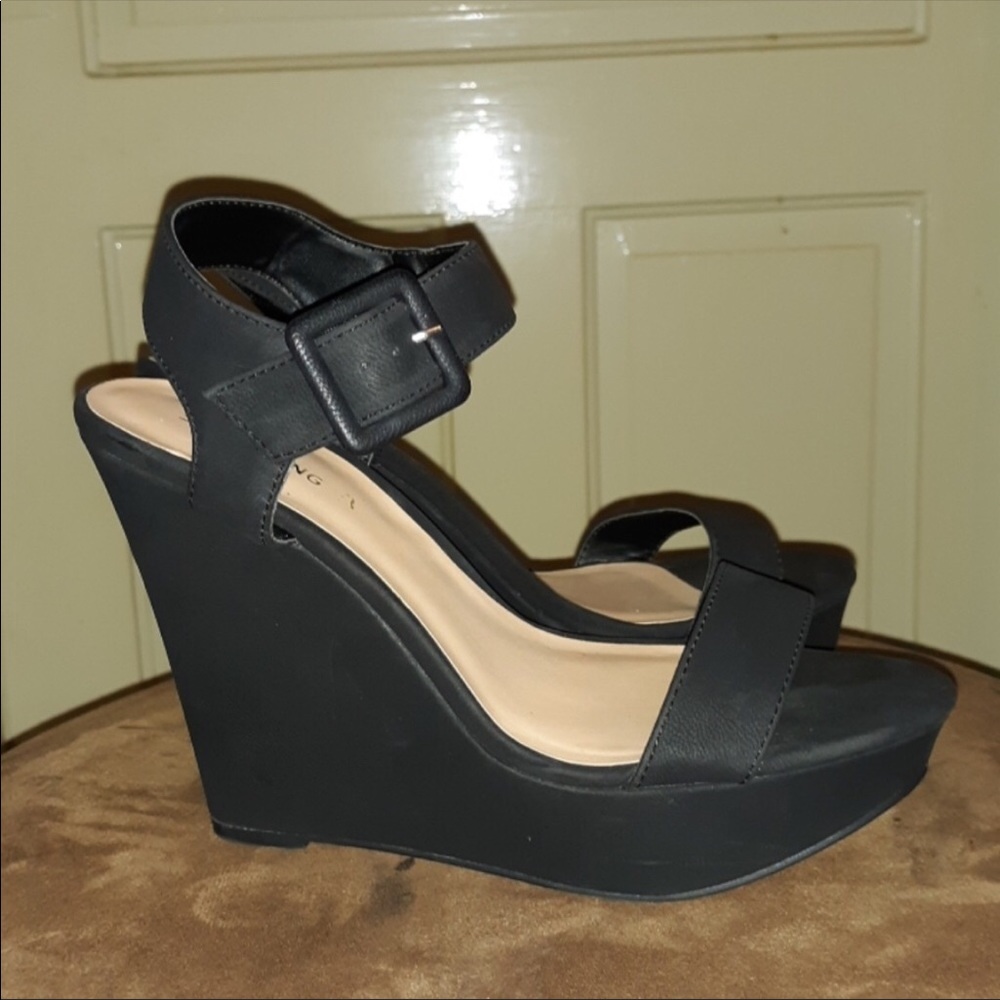 CALL IT SPRING! Black wedges.